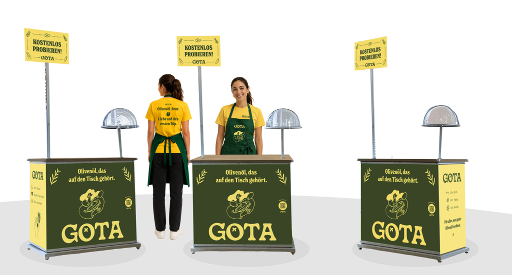 Visualisierung des GOTA-Verkostungsstands aus verschiedenen Perspektiven mit Promoterin in gelbem T-Shirt und grüner Schürze